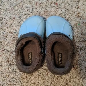 Blue and gray Crocs